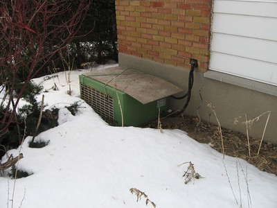 AC unit outside in snow