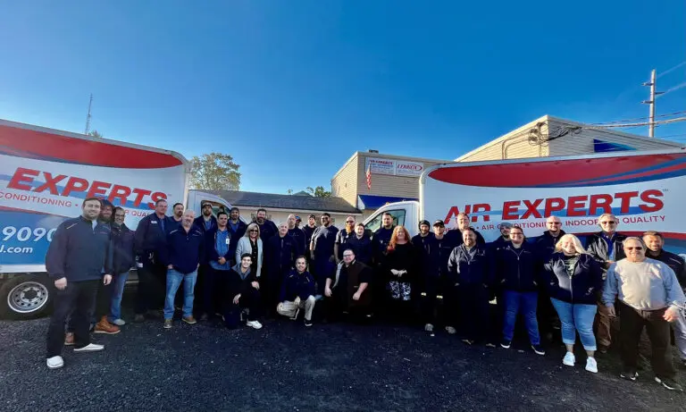 picture of Air Experts team members posing for a picture together