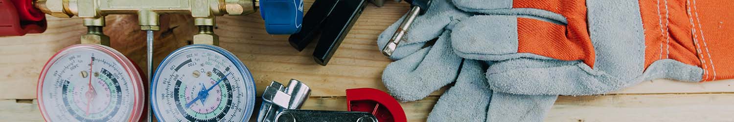 A bunch of HVAC tools laying on the table